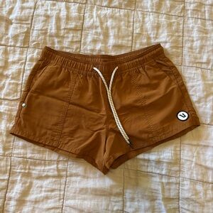Vuori Women's Athletic Shorts in Rust Brown